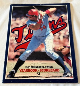 lot 11 image: Kirby Puckett Early Autograph on 1985 Minnesota Twins Baseball Yearbook w Tony Oliva, Frank Viola, Mickey Hatcher, Roy Smalley, Rick Lysander