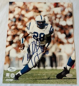lot 50 image: Marshall Faulk 8x10 Football Photo w JSA COA