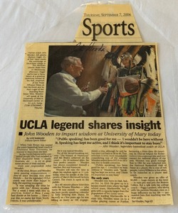 lot 69 image: John Wooden Autographed Newspaper Article, Laminated