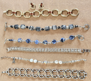 6 Bracelets one with Matching Earrings