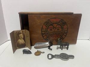 lot 42 image: Vintage Slide Top Box with Misc Treasures Old Photo, Metal Donkey, Shoe Horn, Metal Pig, Worlds Fair Token