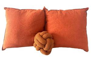 BR1 - Two Orange Textured Throw Pillows & Knot Pillow