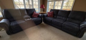Two-Piece Living Room Set Featuring Loveseat with Center Console and Matching Three-Seat Sofa in Leatherlike