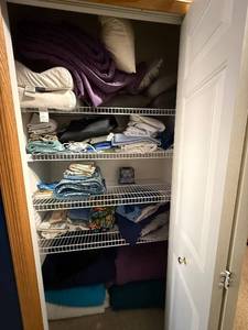 Assorted Bedding in Closet - Blankets, Sheets, Towels & Pillows