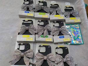 lot 40 image: Heyday Phone Cases and Key Chain Ch...