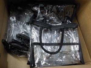 lot 91 image: Case of 25 Clear Purses...