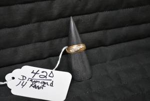 Mans ring 14karat with diamond...