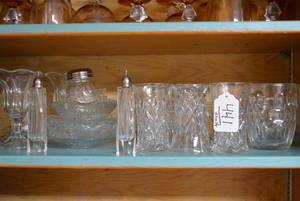 Clear glass bowls, glasses, salt an...