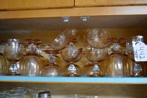 Stemware, various sizes. Light ambe...
