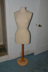 Mannequin on wood base...