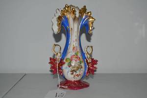 Rocco style vase with extensive gil...