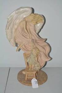 Resin Angel figurine done in pastel...