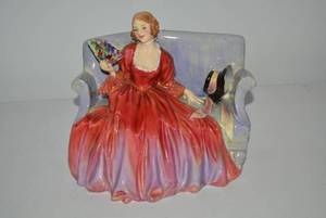 Royal Doulton porcelain seated lady...
