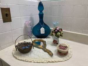 Metal basket, button bouquet, bottl...