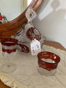 1906 red glass cup, other stemware,...