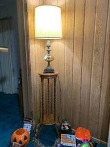 Brass lamp and wood stand...
