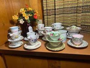 Red glass with cup and saucer colle...