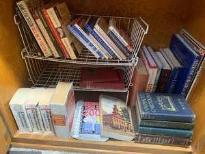 Assorted books all in cupboard...