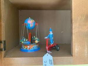 Tin toys - globe carousal made in W...