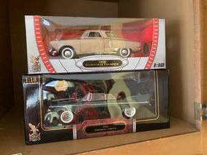 (2) die cast collector cars...
