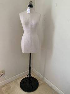 Mannequin on heavy metal base, with...