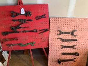 2 pegboards with old wrenches...