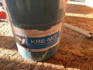 Blue tin and garden tools...