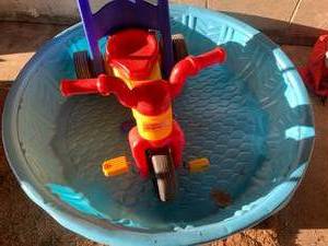 Fisher Price toy trike and kids poo...