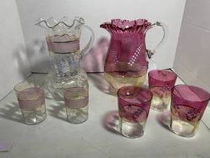 Ruffled pitchers, pink and cranberr...