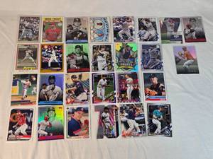 Lot of 27 Baseball Cards Featuring Players like Mike Trout, Nolan Ryan, and Derek Jeter with Various Sets and Rookie Cards.