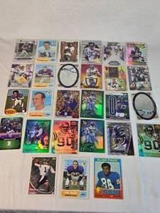 Lot of 27 Minnesota Vikings Football Cards featuring players like Alan Page, Warren Moon, Justin Jefferson, and Adrian Peterson. Includes Rookie, Holo, and Vintage cards.