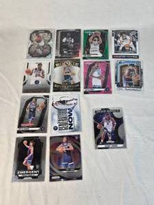Lot of 13 Minnesota Timberwolves Basketball Cards featuring players like Anthony Edwards, Rudy Gobert, and Jaden McDaniels. Includes Rookie, Holo, and Special Edition cards such as Deep Space and Emergent.