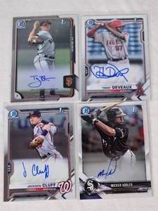 Lot of 4 Rookie cards with On Card Autos Trent Deveaux, Micker Adolfo, Ty Blach, and Jackson Cluff