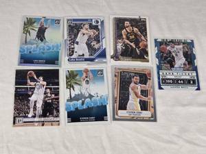 Lot of 7 Basketball Cards Featuring Luka Doncic, Stephen Curry, and Lonzo Ball
