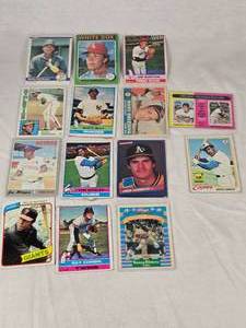 Lot of Vintage Baseball Cards Featuring Key Players Including Rickey Henderson, Jose Canseco, and Willie McCovey.