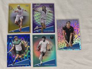 Lot of 5 Numbered Tennis Refractors Featuring Pablo Andujar, John Newcombe, Thiago Seyboth Wild, Alejandro Davidovich Fokina, and Charles Pasarell