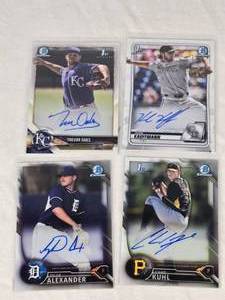 Lot of 4 Rookie Baseball Cards with On Card Autos Featuring Karl Kauffmann, Chad Kuhl, Trevor Oaks, and Tyler Alexander