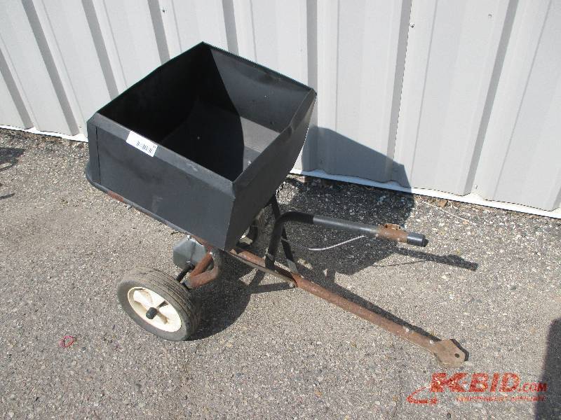 Tow behind spreader