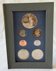 1986 Prestige Ellis Island Silver Proof set 7 coins - no COA or other packaging, smoke damage on nearly all coins except silver dollar