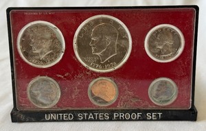 1975 Proof Set - case is dirty slight fire damage, no other packaging or COA