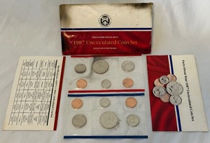 1987 PD Uncirculated US Mint set OGP - original package but with fire damage