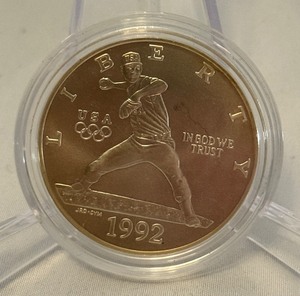 1992 D-Olympic Baseball Commemorative Uncirculated Silver Dollar - just the coin in a protective plastic case, one appears to have slight fire damage