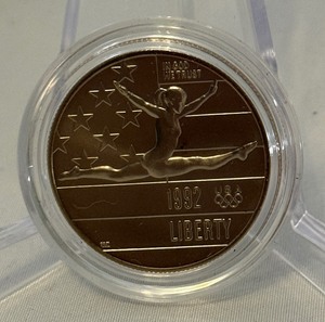 1992 P-Olympic Gymnastics Commemorative Clad Uncirculated Half Dollar - just the coin in a protective plastic case