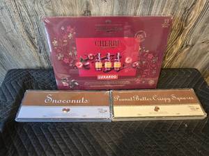 (3) Boxes of Assorted Chocolates, Chocolate Covered Cherries, Snoconuts and Peanut Butter Crispy Squares