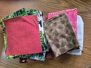 2 6-Inch-High Piles of Quilting Squares