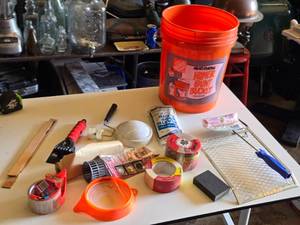 Painting Supplies including Home Depot Paint Bucket, Drop Cloth, and Roller Accessories