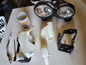 Jaguar Headlight Assembly with Reservoirs and Bracket