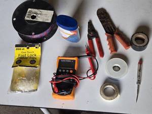 Electrical Tools and Supplies including Klein Tools Multimeter, Wire Strippers, and Cable Ties