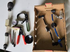 Automotive Testing Tools and Accessories including Brake Bleeder and Vacuum Pump Kit, Coolant Tester, Oil Filter Wrench and Accessories