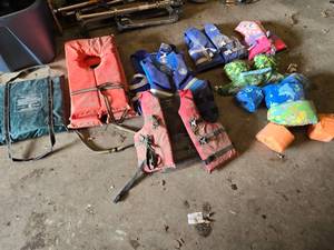 Various Life Jackets and Flotation Devices